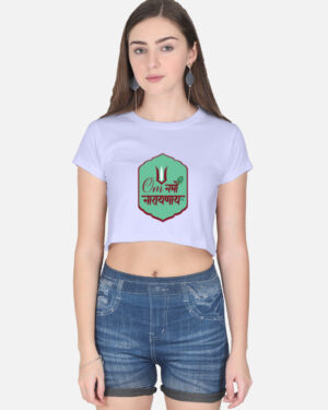 A woman wearing a lavender half-sleeve crop top with a green badge graphic featuring the "Om Namo Narayanaya" mantra in Devanagari script.