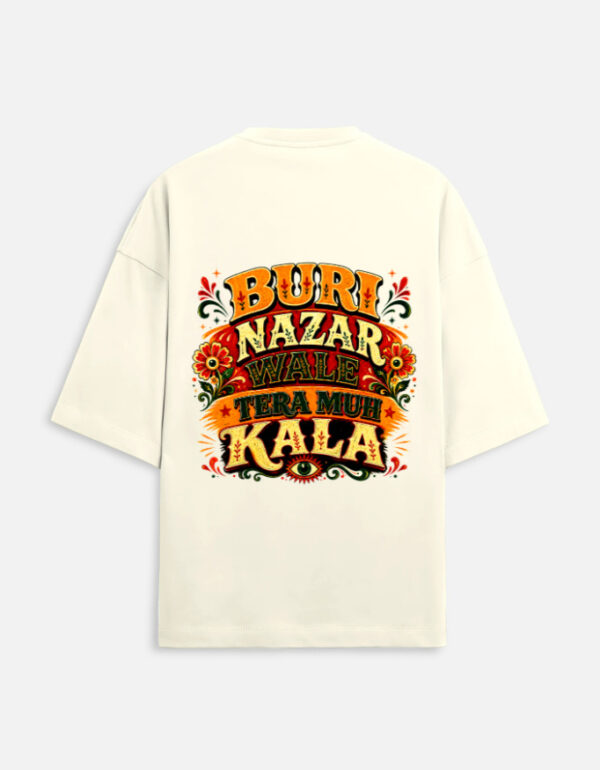 Unisex off-white terry oversized t-shirt featuring a vibrant Indian truck-art style typography graphic print on the back with the phrase "Buri Nazar Wale Tera Muh Kala" and a protective evil eye motif.