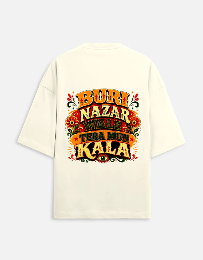 Unisex off-white terry oversized t-shirt featuring a vibrant Indian truck-art style typography graphic print on the back with the phrase "Buri Nazar Wale Tera Muh Kala" and a protective evil eye motif.