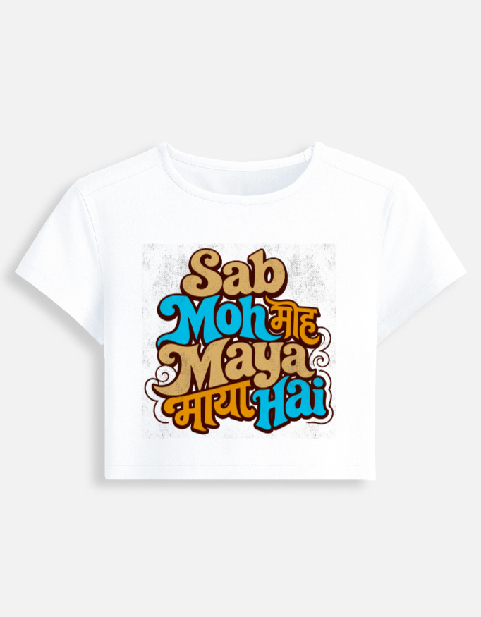 White fitted baby tee featuring a colorful retro typography graphic print on the front with the phrase "Sab Moh Maya Hai" in English and Devanagari script.