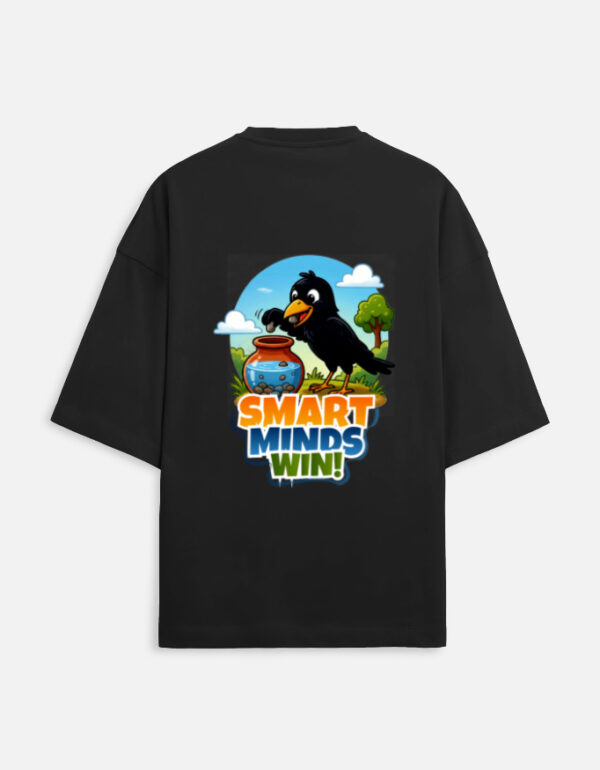 Unisex black terry oversized t-shirt featuring a colorful cartoon graphic on the back of a thirsty crow putting pebbles into a water pot with "Smart Minds Win!" text.