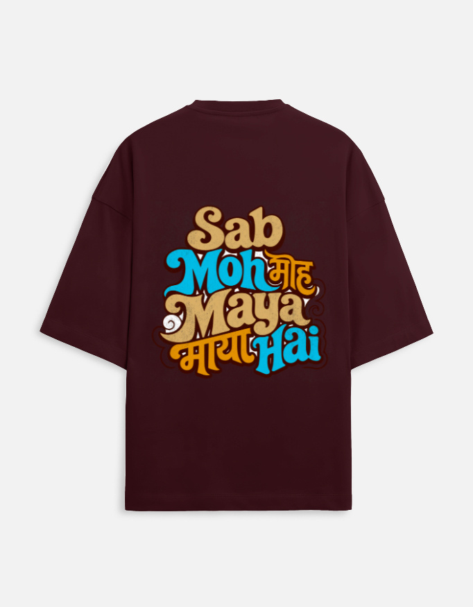 Unisex maroon terry oversized t-shirt featuring a colorful retro typography graphic print on the back with the phrase "Sab Moh Maya Hai" in English and Devanagari script.